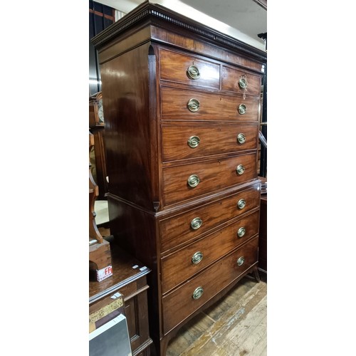 722 - A 19th century mahogany chest on chest, the top having two short and three long drawers, the base wi... 