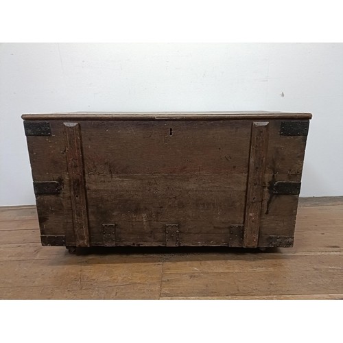 775 - An oak and metal bound chest, 112 cm wide