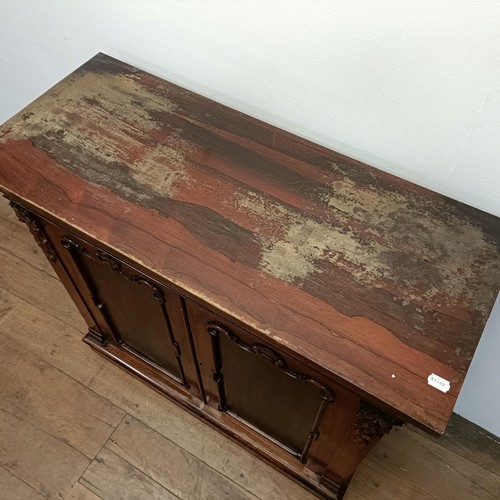 776 - An early Victorian rosewood chiffonier, with two cupboard doors, 103 cm wide