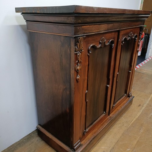 776 - An early Victorian rosewood chiffonier, with two cupboard doors, 103 cm wide