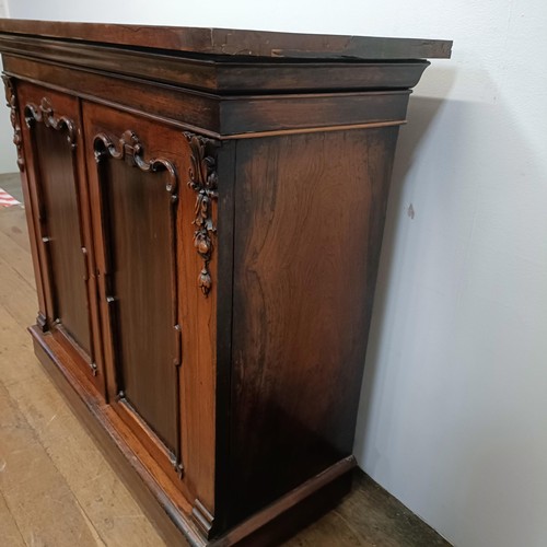 776 - An early Victorian rosewood chiffonier, with two cupboard doors, 103 cm wide