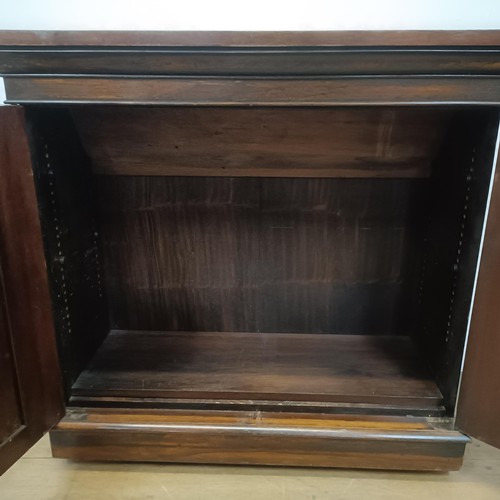 776 - An early Victorian rosewood chiffonier, with two cupboard doors, 103 cm wide