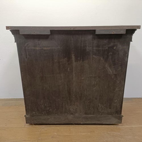 776 - An early Victorian rosewood chiffonier, with two cupboard doors, 103 cm wide