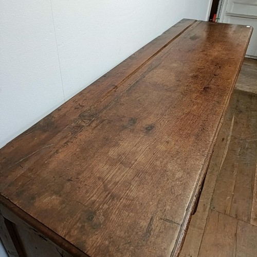 778 - A 19th century French inlaid oak dresser, having three drawers and three cupboard doors, 194 cm wide