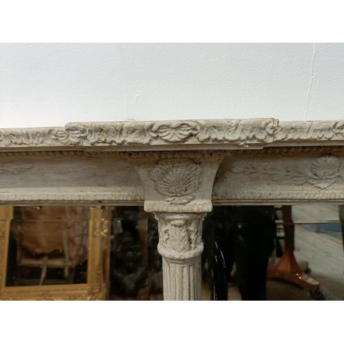 784 - A painted triple overmantel mirror, with Corinthian column supports, 116 x 180 cm