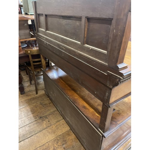 788 - A late 19th/early 20th century walnut buffet, by James Shoolbred & Co, having a carved raised ba... 