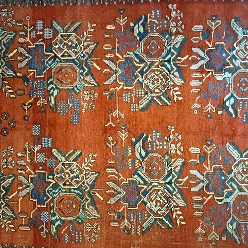 807 - An Hariz red ground rug, 180 x 158 cm