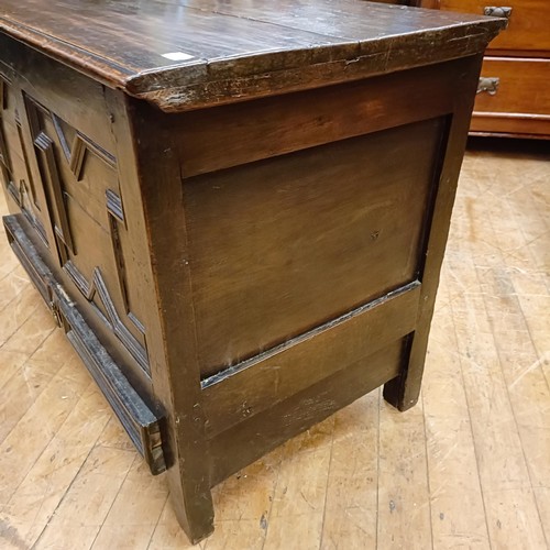 830 - An oak mule chest, with a geometric moulded front, 96 cm wide