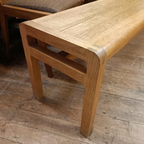 489 - A 20th century light oak bench, 183 cm wide