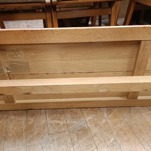 489 - A 20th century light oak bench, 183 cm wide