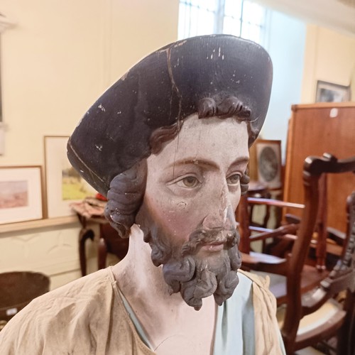 615 - A large painted wood and gesso figure of a man with a beard, 104 cm high