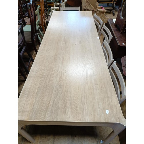 496 - ***Regretfully withdrawn***A limed oak dining table, the top 243 x 90 cm, and five matching chairs (... 