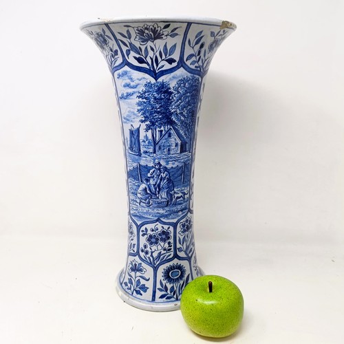 613 - A Delft blue and white vase, 40 cm high