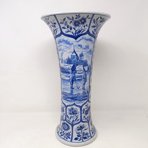 613 - A Delft blue and white vase, 40 cm high