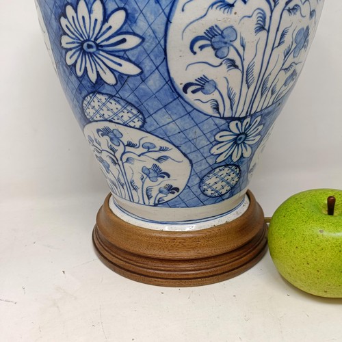 617 - A Delft blue and white vase, converted to a lamp, 38 cm high