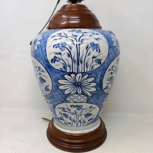 617 - A Delft blue and white vase, converted to a lamp, 38 cm high