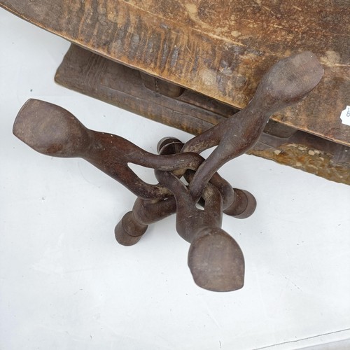 616 - An African carved stool, 49 cm wide, and a similar stand (2)