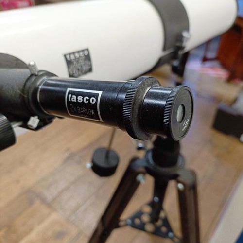 620 - A Tasco 11T 300X telescope, boxed