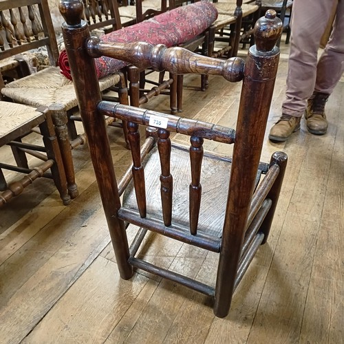 735 - A Country made spindle back chair, and a nursing chair (2)