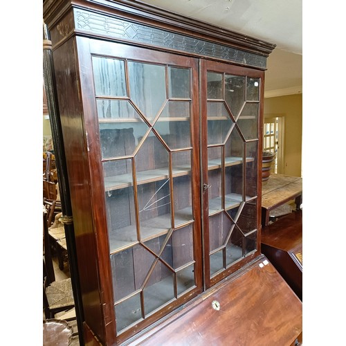 754 - A mahogany bureau bookcase, 110 cm wide