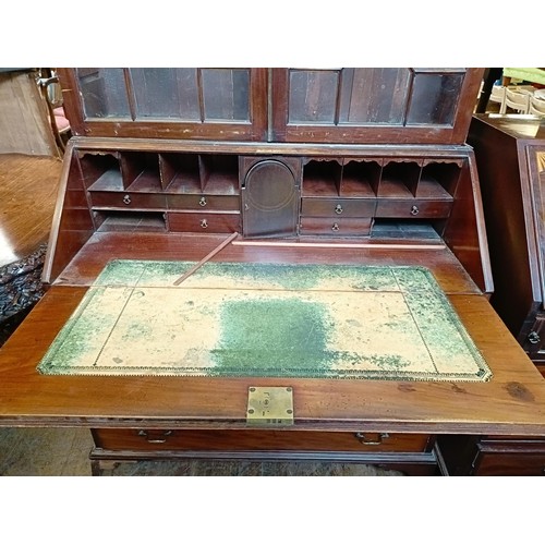 754 - A mahogany bureau bookcase, 110 cm wide