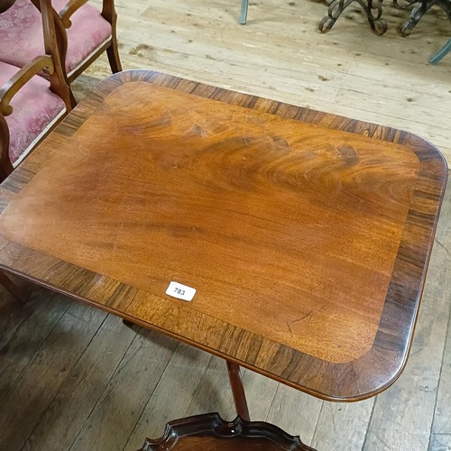 783 - A Victorian mahogany tripod table, 66 cm wide, and a George III style tripod table (2)