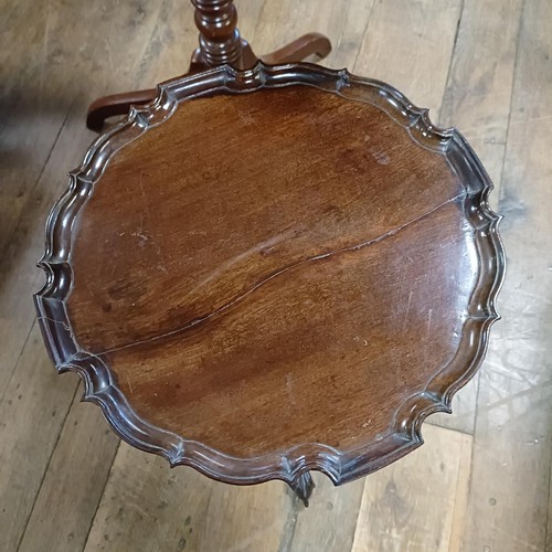 783 - A Victorian mahogany tripod table, 66 cm wide, and a George III style tripod table (2)