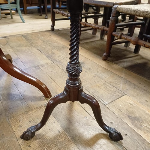 783 - A Victorian mahogany tripod table, 66 cm wide, and a George III style tripod table (2)