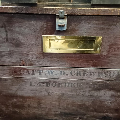 781 - A stained pine trunk, inset with brass letterbox, stamped Capt W D Chewdson..., 101 cm wide