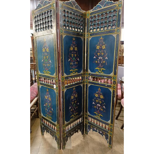 800 - A painted Moroccan four panel screen, each panel 186 x 45 cm