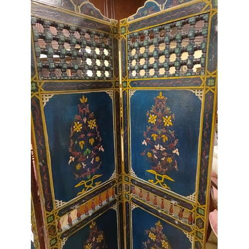 800 - A painted Moroccan four panel screen, each panel 186 x 45 cm