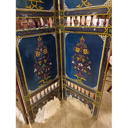 800 - A painted Moroccan four panel screen, each panel 186 x 45 cm