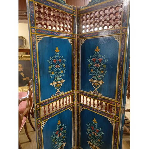 801 - A painted Moroccan four panel screen, each panel 187 x 45 cm