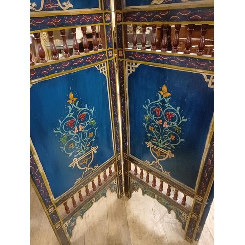 801 - A painted Moroccan four panel screen, each panel 187 x 45 cm