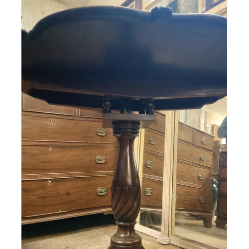 782 - A George III style mahogany tilt top tripod table, the base with a birdcage support, 80 cm diameter