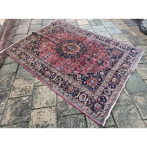 799 - A Persian type red ground carpet, 318 cm x 240 cm