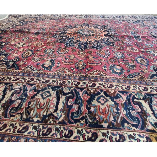 799 - A Persian type red ground carpet, 318 cm x 240 cm