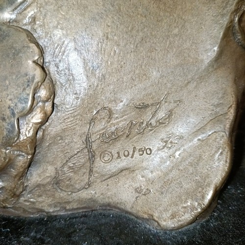 487 - Roberto Santo, a gilt bronze lily on a polished slate base, 100 cm high