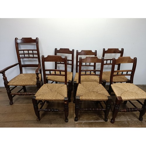 1258 - A set of seven country made elm dining chairs (6+1)