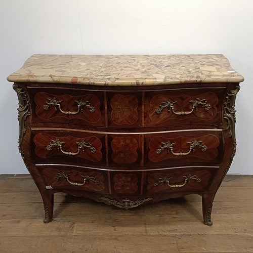 1287 - A Continental parquetry inlaid rosewood bombe commode, the marble top above three drawers, with gilt... 