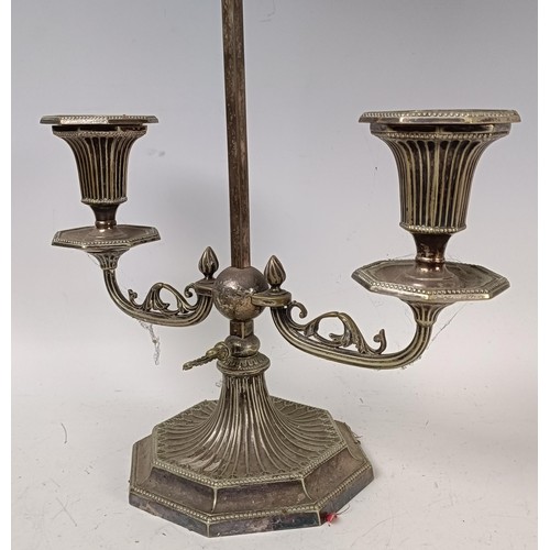 1041 - A silver plated student's lamp, lacking shades, 50 cm high