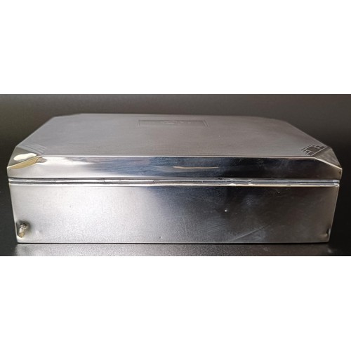 3 - A George V Art Deco silver cigarette box, Birmingham 1935, 17 cm wide