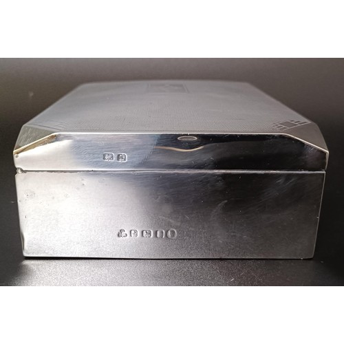 3 - A George V Art Deco silver cigarette box, Birmingham 1935, 17 cm wide...