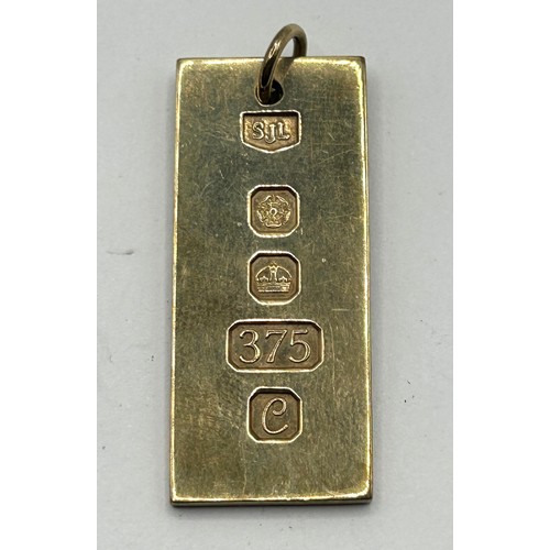 612 - A 9ct gold ingot pendant, London 1977, 15.9 g