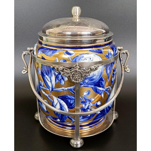 11 - A Victorian silver mounted biscuit box, London 1883, 24 cm high (overhandle)