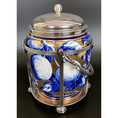 11 - A Victorian silver mounted biscuit box, London 1883, 24 cm high (overhandle)