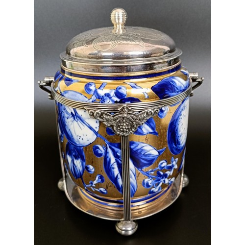 11 - A Victorian silver mounted biscuit box, London 1883, 24 cm high (overhandle)