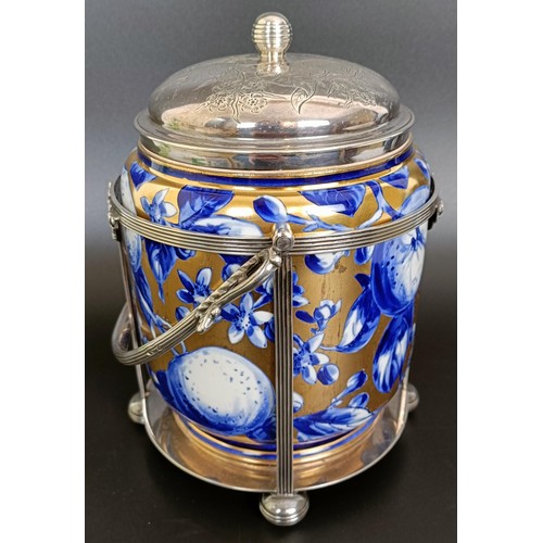 11 - A Victorian silver mounted biscuit box, London 1883, 24 cm high (overhandle)