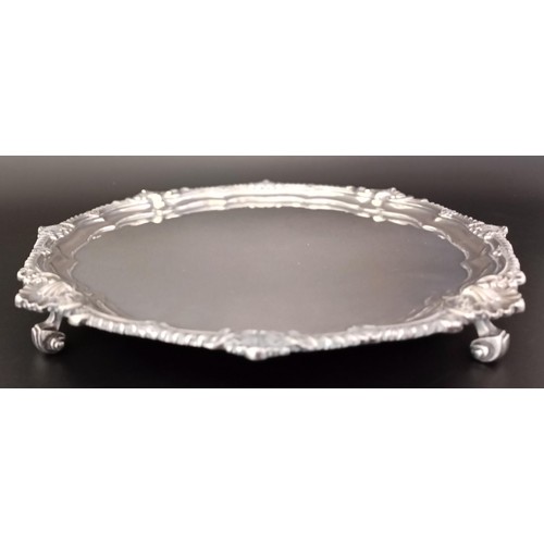 17 - A late Victorian silver salver, Sheffield 1899, 36.6 ozt, 33.5 cm diameter...