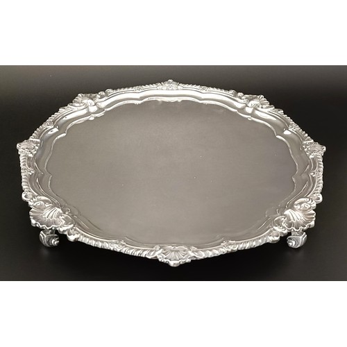 17 - A late Victorian silver salver, Sheffield 1899, 36.6 ozt, 33.5 cm diameter